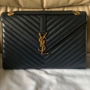Navy Blue Saint Laurent Matelasse Monogram Bag.